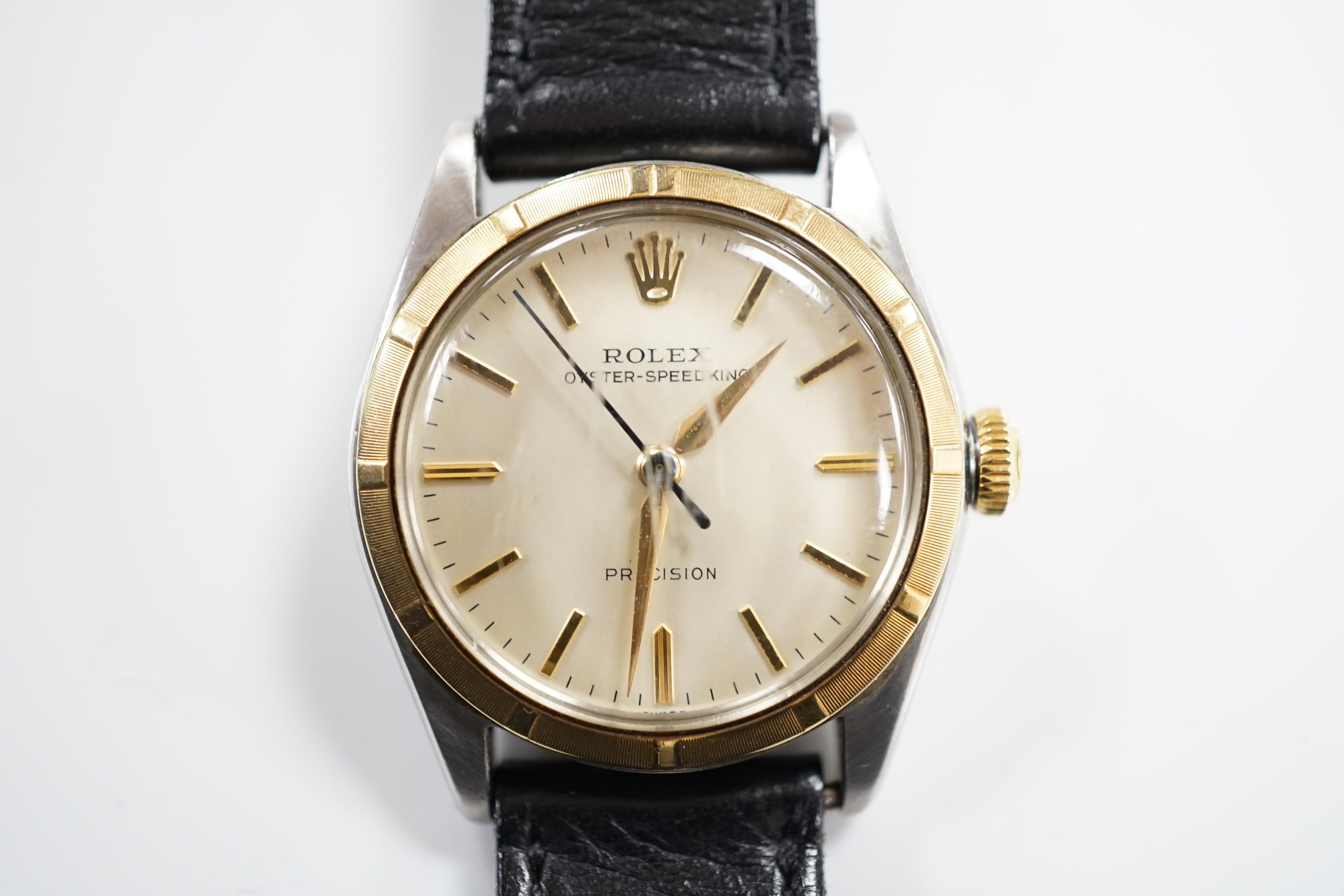 A gentleman's 1950's? steel and gold plated mid-size Rolex Oyster-Speed King Precision manual wind wrist watch, with baton numerals, model number 5021, serial number 654122, case diameter 32mm, on an associated leather s